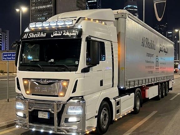 White MAN truck in Riyadh at night